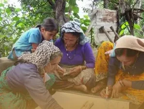 Women working together on a community activity